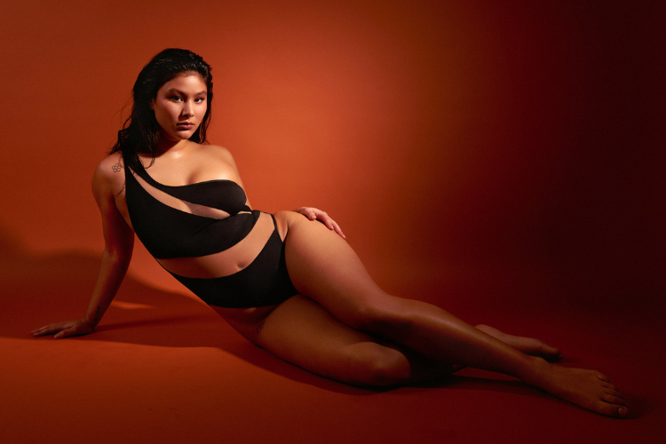 Model wears new season Wolf & Whistle sexy Eloise black and mesh swimsuit