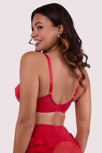 Model shows hook and eye fastening back of red satin bow plunge bra with adjustable shoulder straps