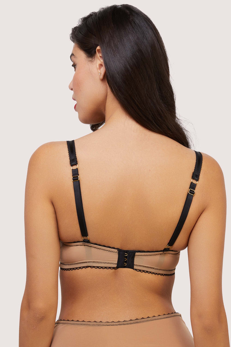 Model shows adjustable shoulder straps and hook and eye fastening back of push up bra