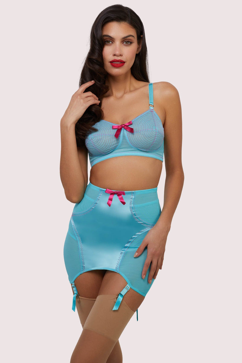 Model wears retro electric sky blue high waist girdle and spiral bullet bra set