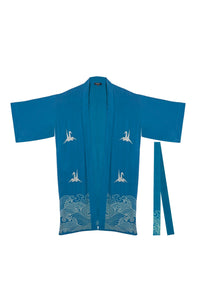 Long teal lined kimono style belted robe with ivory embroidered origami heron and Japanese waves