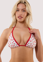 Fuller Bust|Model wears a cherry red and white fuller bust triangle bikini top with classic triangle shape featuring red trim cherry charms.