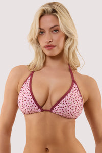 Model wears a meadow pink and wine fuller bust triangle bikini top with classic triangle shape featuring wine trim cherry charms.