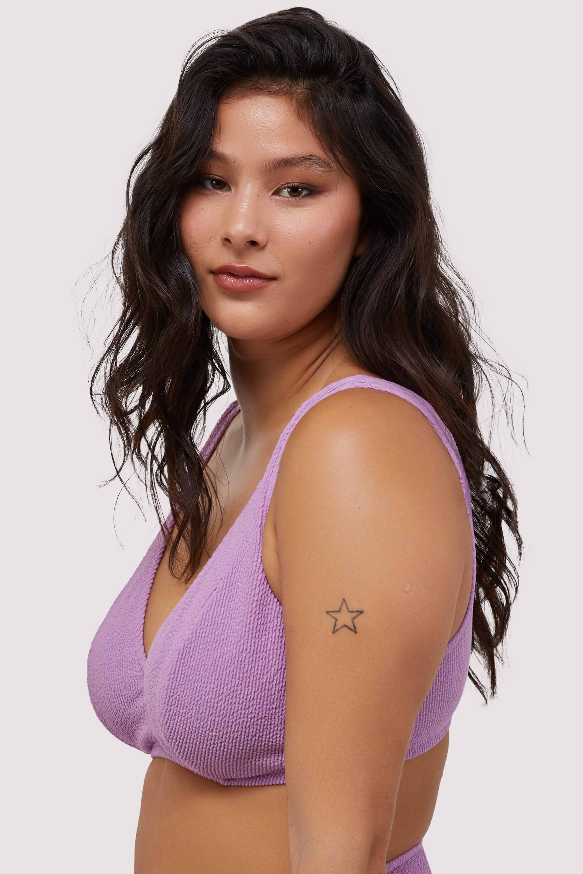 model wears lilac scrunch fabric underwire bikini top with thick shoulder straps