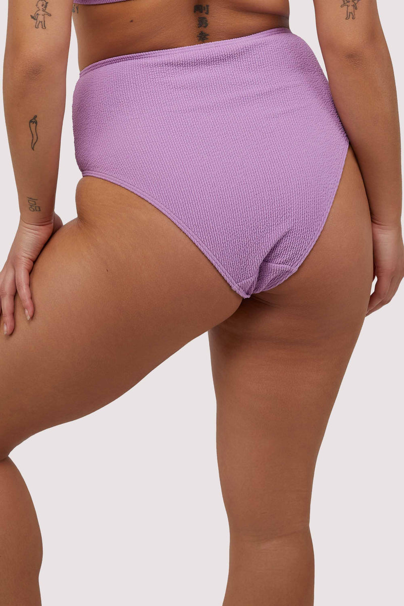 model shows full brief back of high waist lilac scrunch fabric bikini bottoms