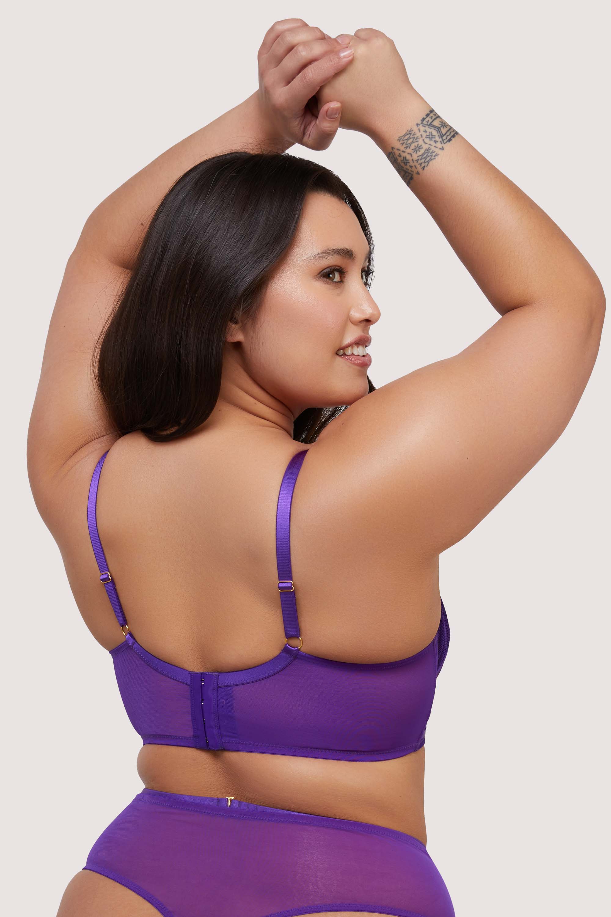 model shows purple sheer mesh hook and eye fastening bra back