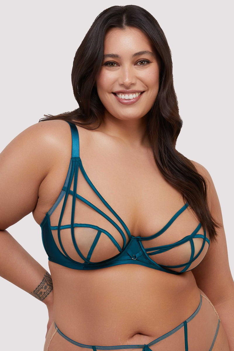 model wears teal bra with straps