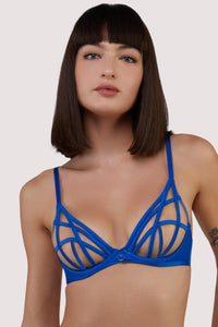 model wears cobalt blue plunge bra with straps