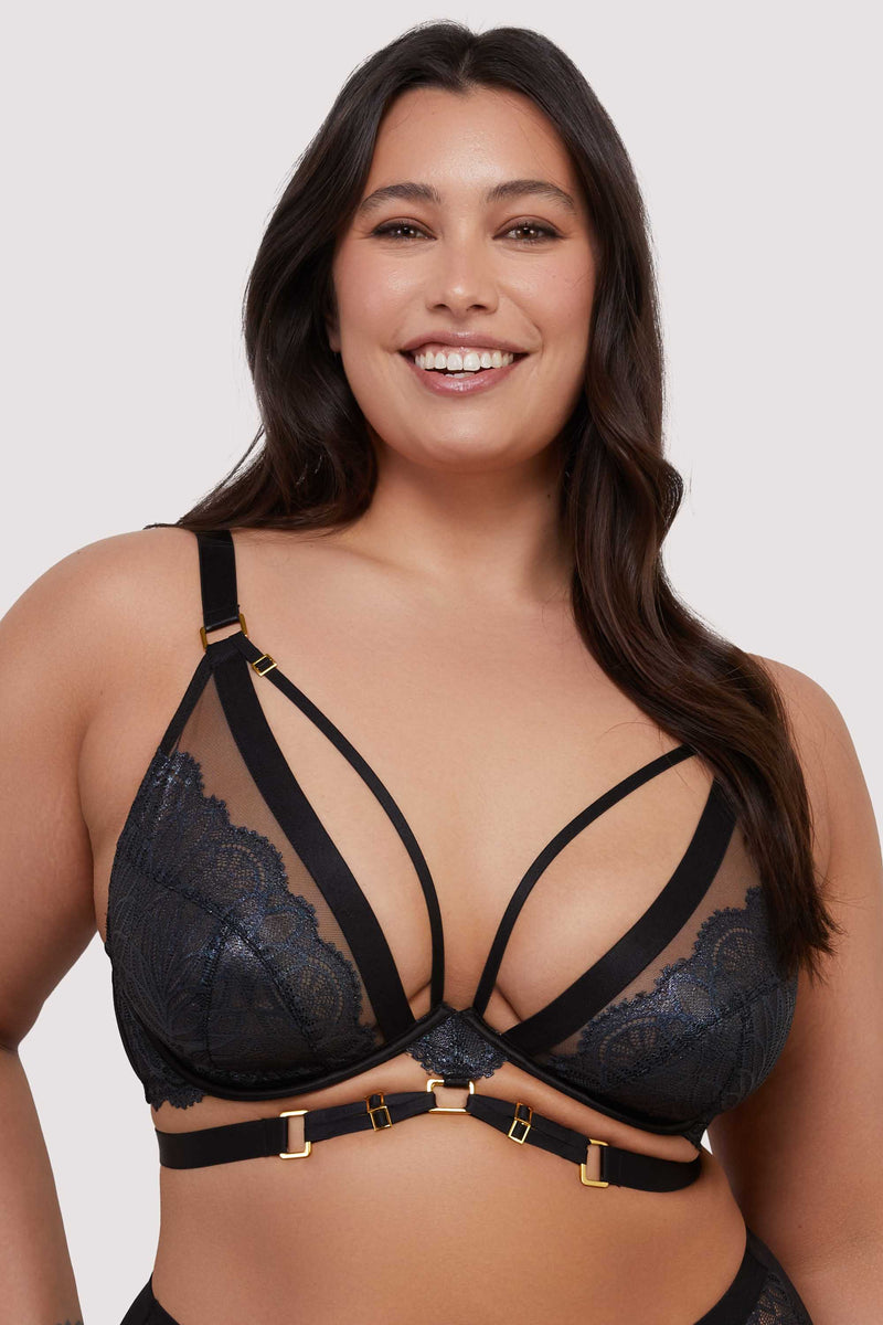 model wears black wet look lace plunge bra with straps