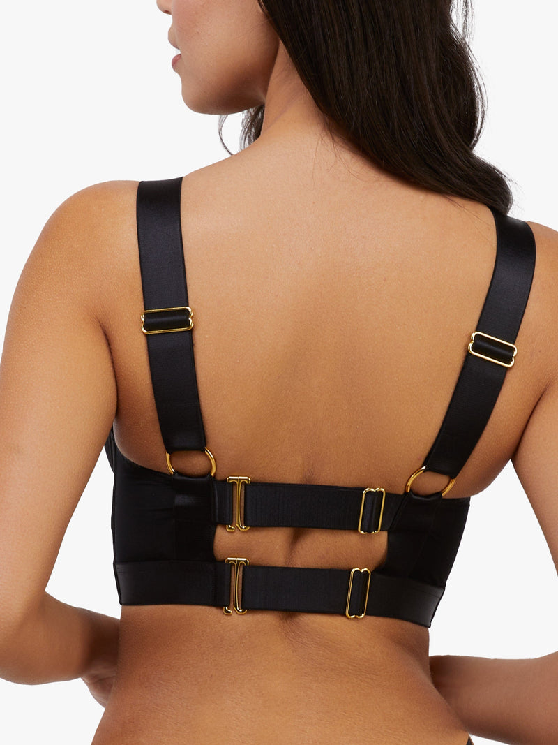 model shows black g-hook fastening harness bra back