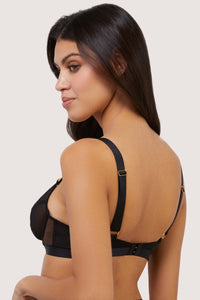 Model shows adjustable shoulder straps and hook and eye fastening back of sexy black bra