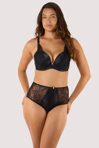 Model wears black padded plunge bra with matching high waist brief sheer mesh plunge cups longline underband