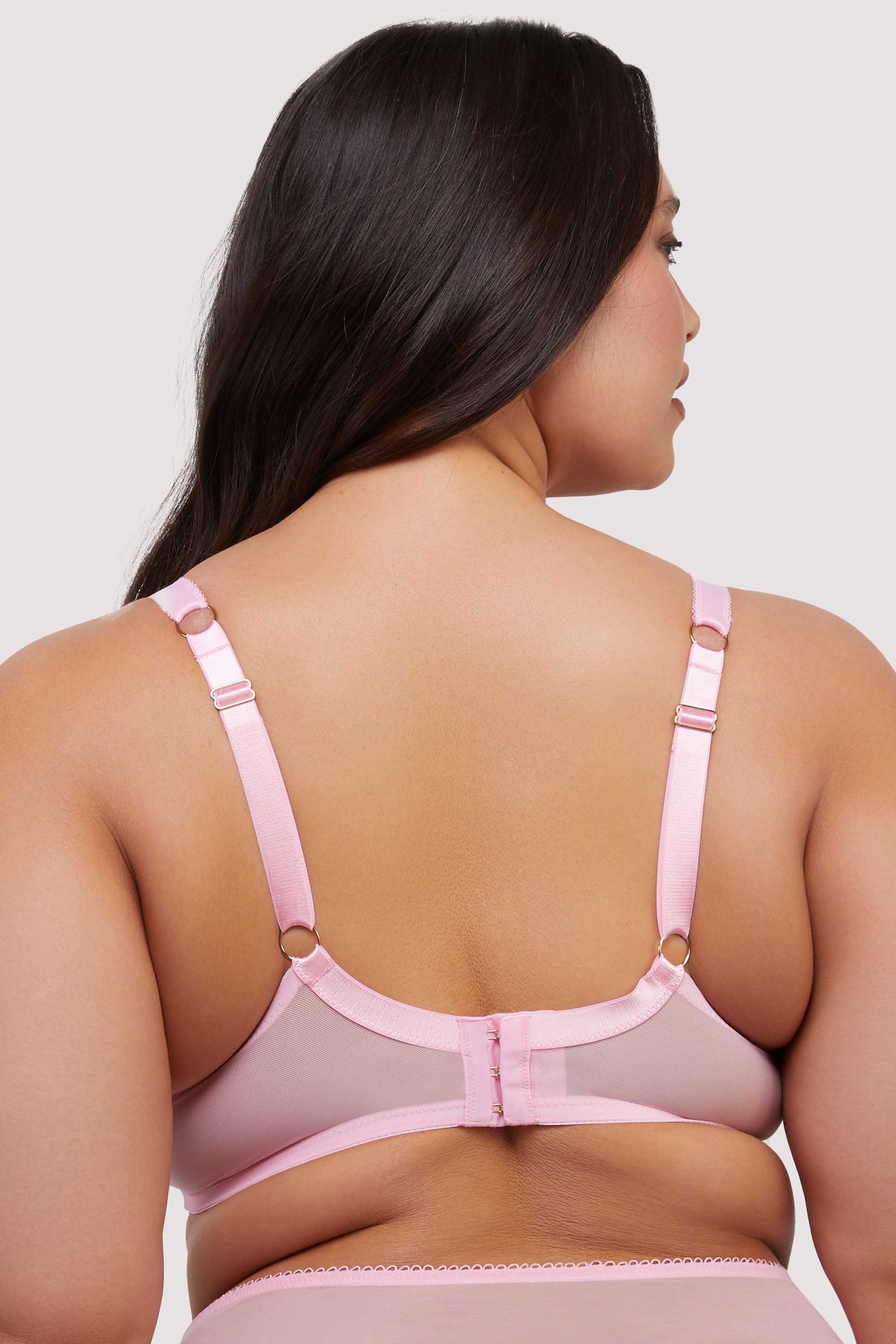 model shows pink mesh hook and eye fastening bra back