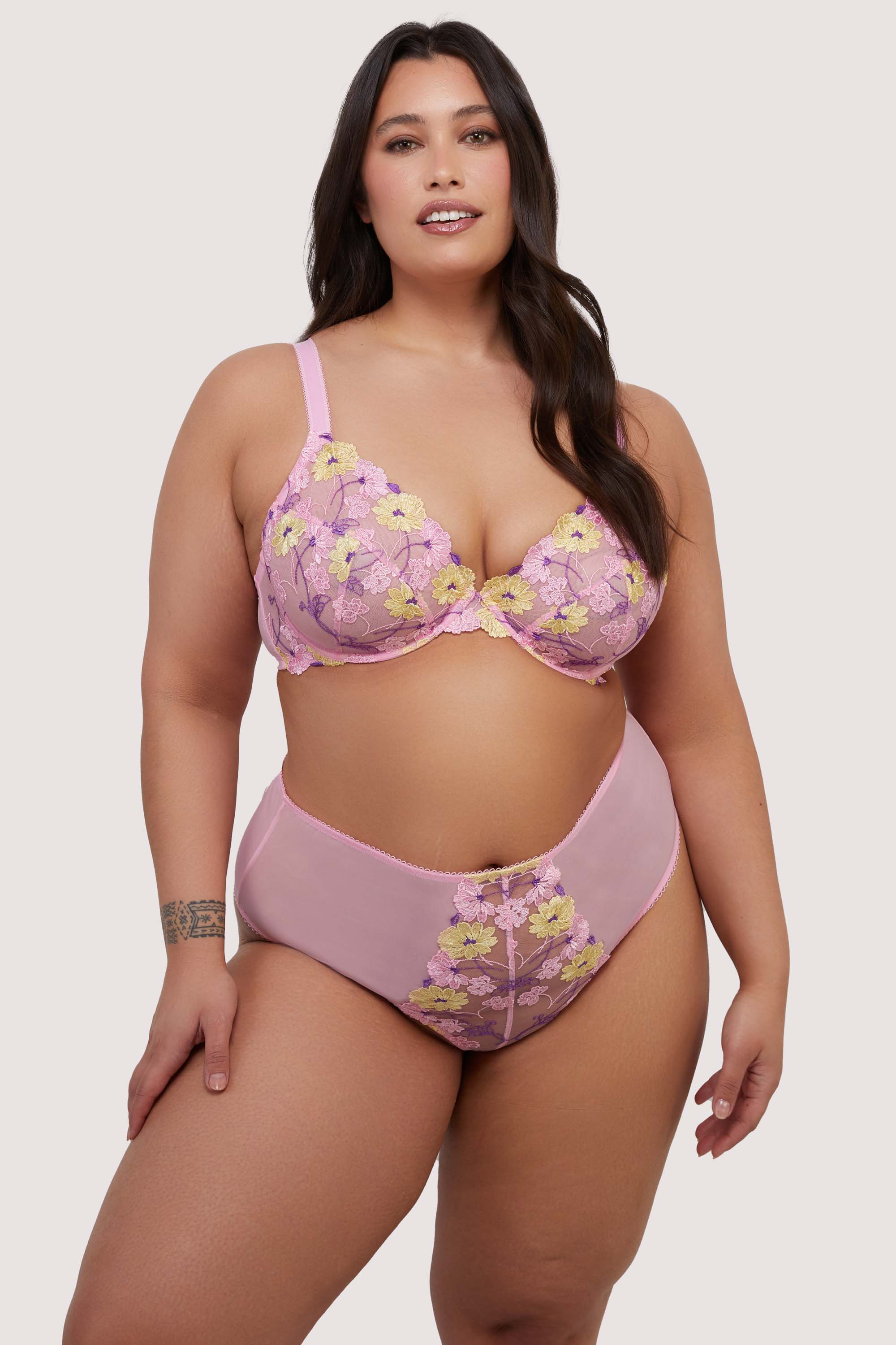 model wears pink floral bra and high waist thong lingerie set