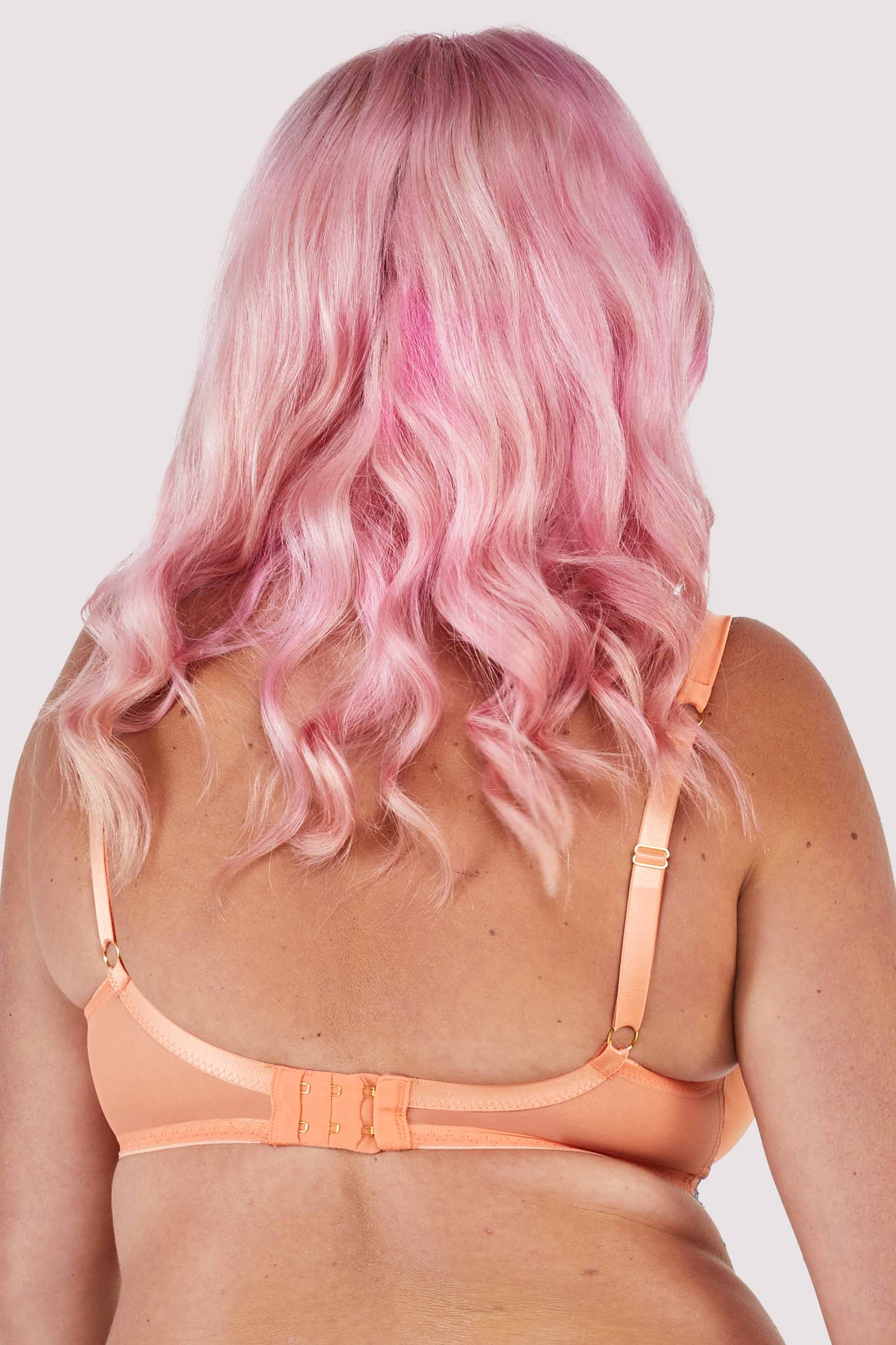 Back view of Mesh and lace orange bra.