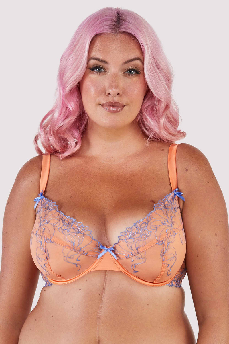 Orange mesh bra with blue-lilac embroidery and bows.