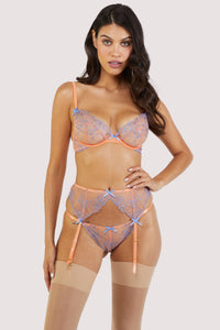 Mesh and lace orange bra, suspender and brief set with lilac/blue lace embroidery accents and bows.