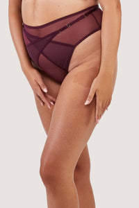 Dark purple-red mesh thong with visible gold hardwear and crossover panelling across the front.