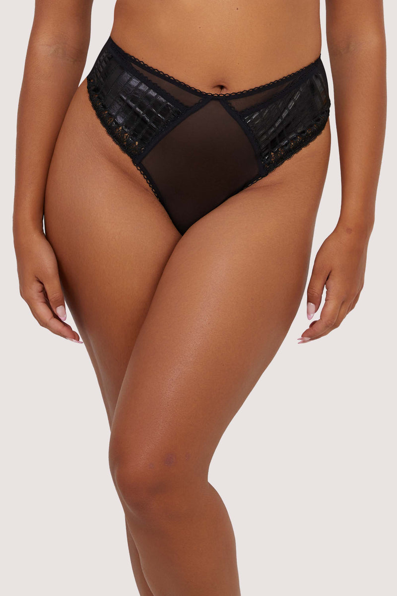 Model wears sheer black mesh high waist thong