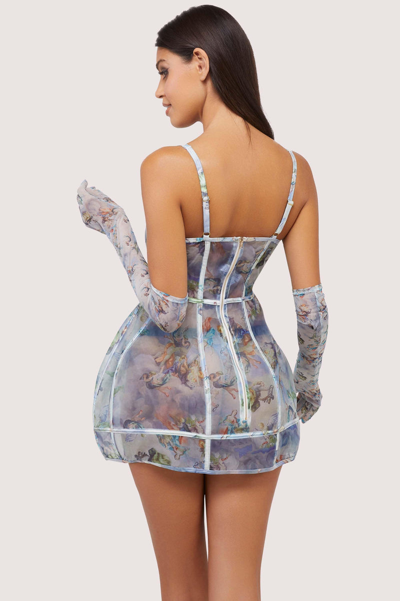 Model shows zip fastening back of Renaissance printed mini dress with adjustable shoulder straps