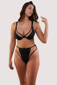 fuller bust model wears black and nude mesh panel bikini sexy swimwear set