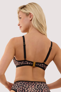 Model wears a lorna leopard print fuller bust underwired bikini top with a matching high waist bikini brief.