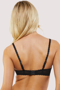 Model Back view of Black Mesh Bra featuring adjustable straps, scalloped edges, and hook-and-eye fastening.