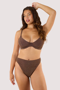 Model Front view of underwire bikini top with matching high-leg bottoms in shimmering bronze fabric.