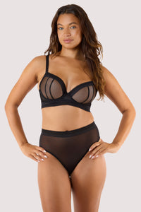 Model wears black sheer plunge bra with matching high waist brief sheer mesh plunge cups longline underband