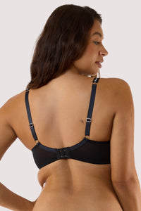 model Shows Back of the  black mesh bra with adjustable straps and hook back fastening