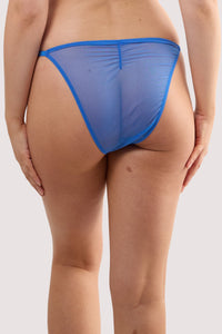 Model shows the back of a hyacinth blue rose embroidery brief.