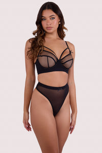 Model wears black mesh high waist thong with matching d+ bra in sheer black mesh.