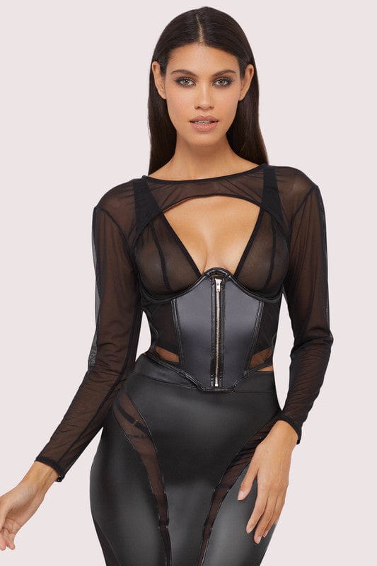Model wears a black vegan leather underbust corset with underwire shaping and sheer mesh front with vegan leather, with a matching shrug.