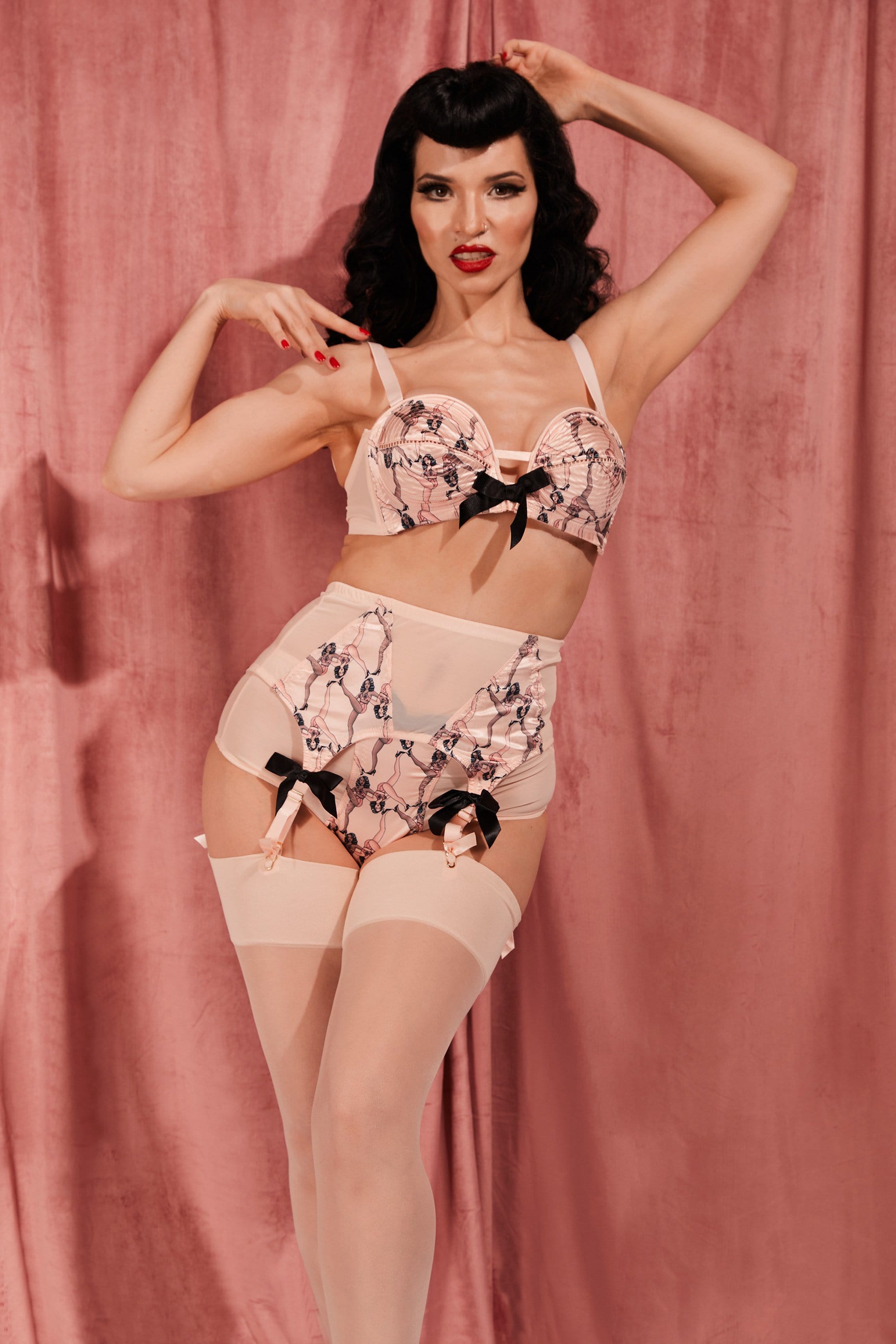 Retro fifties pin-up attractive girl in vintage lingerie Stock